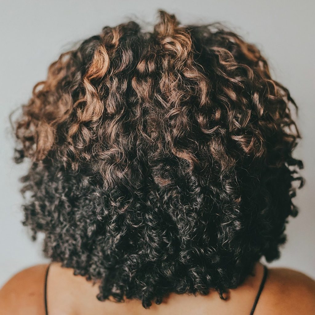 Thick black and brown curly hairs